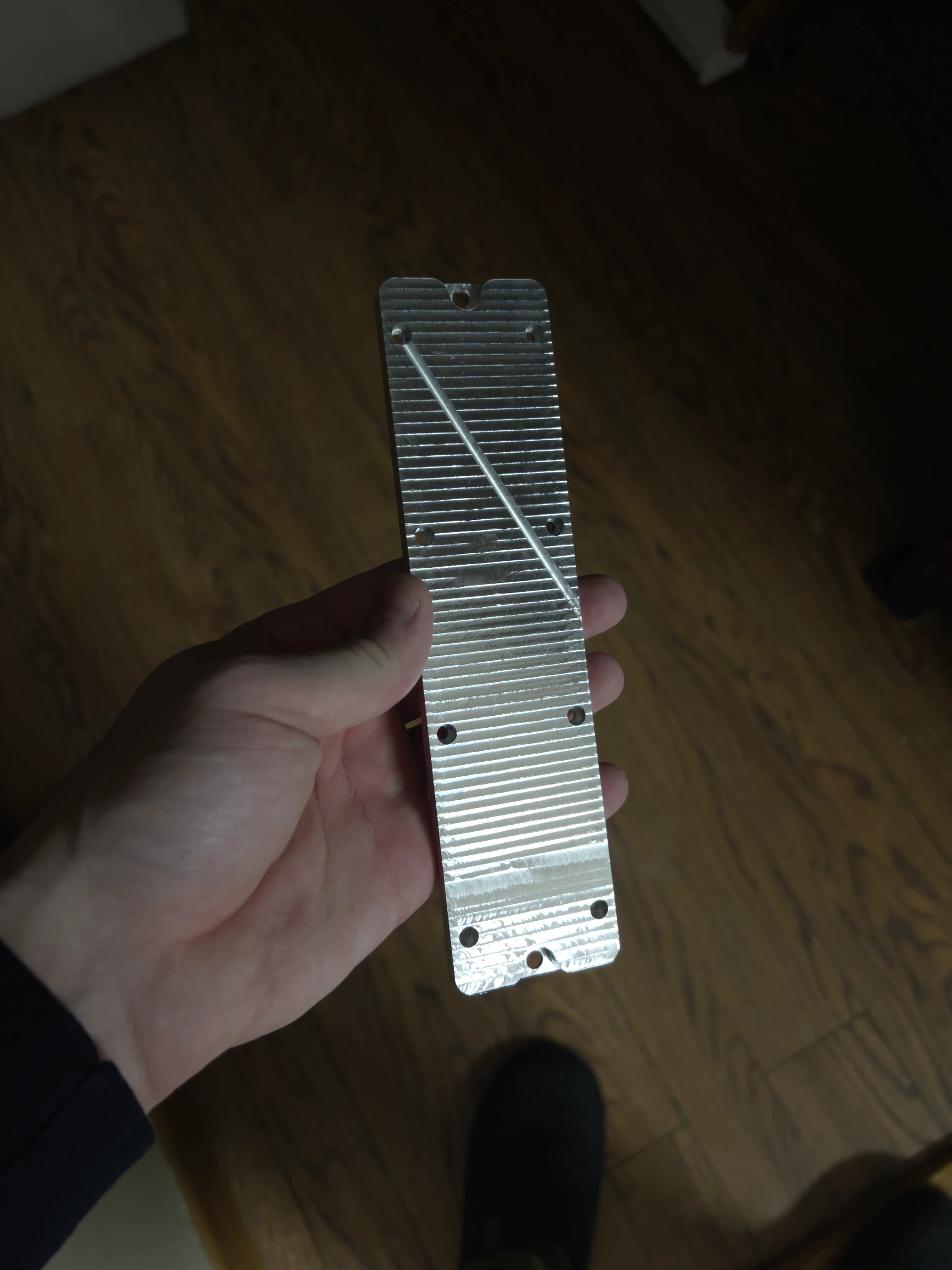 Gouge on the battery holder plate from a machining issue