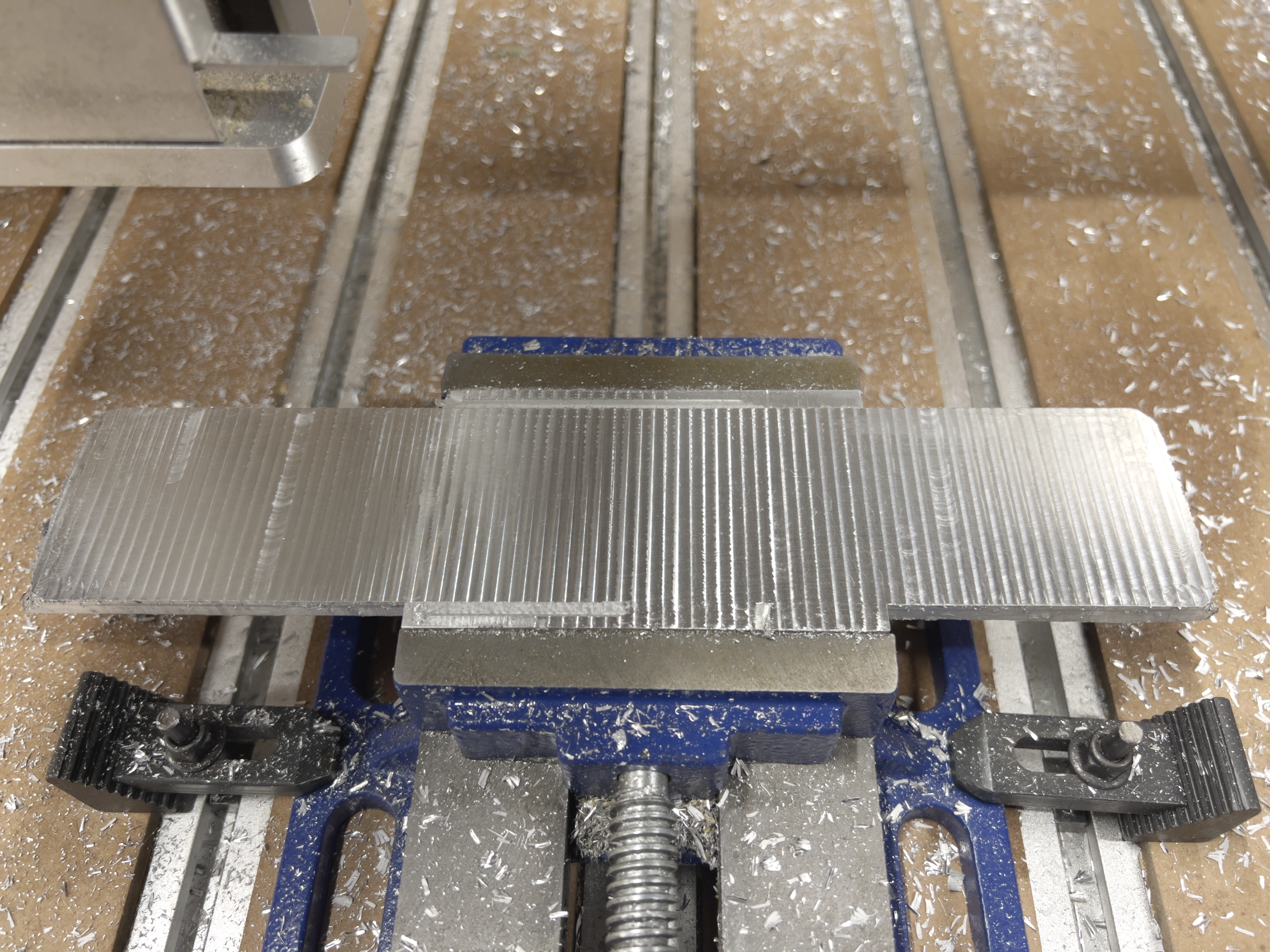 Battery holder plate milled bottom face
