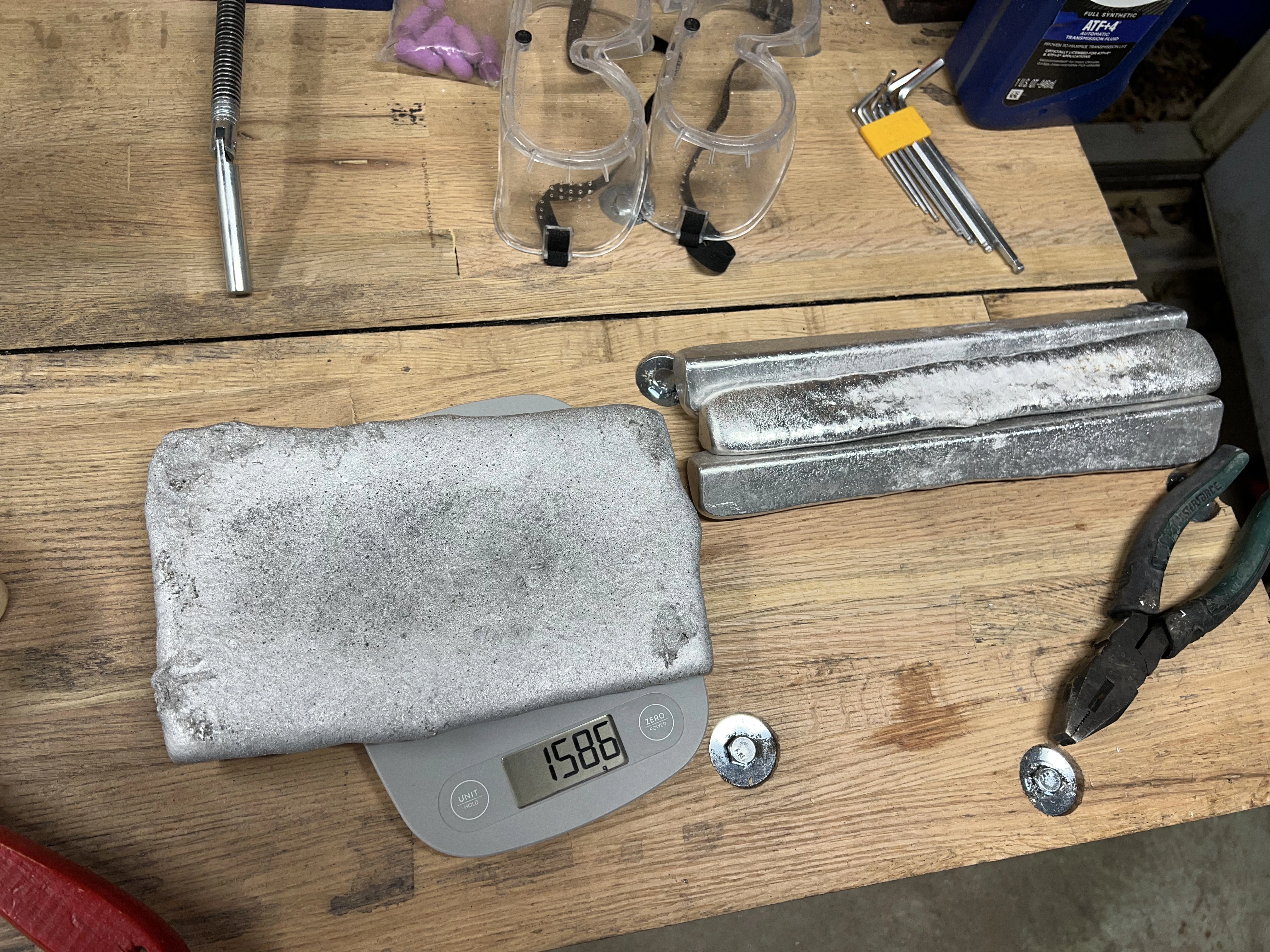 Triangular ingots and resulting stock plate